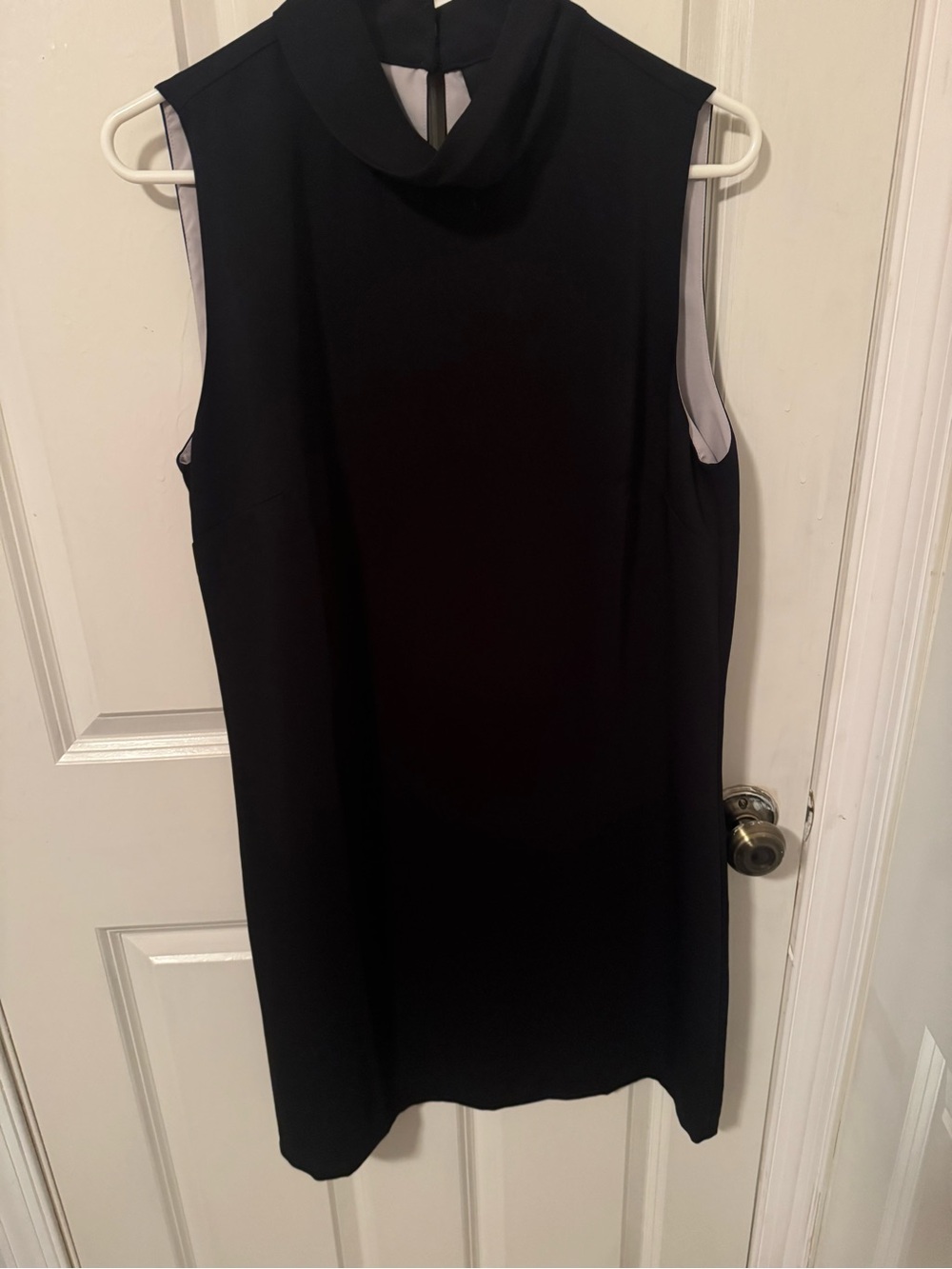 Cynthia Rowley Black Garment with Teal Logo